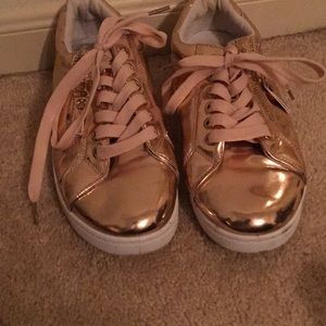 Rose gold tennis shoes